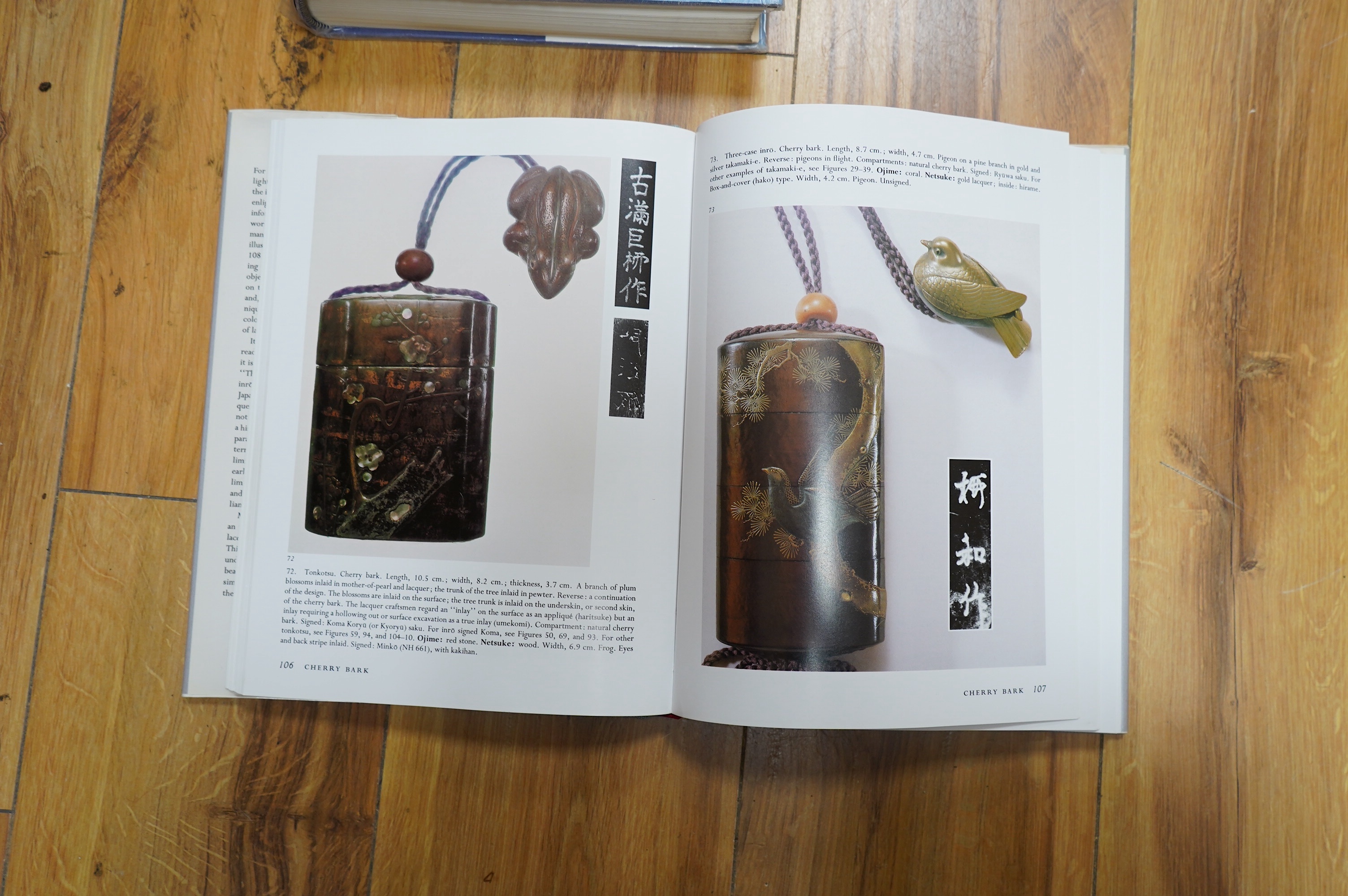 A group of reference books relating to netsuke and inro